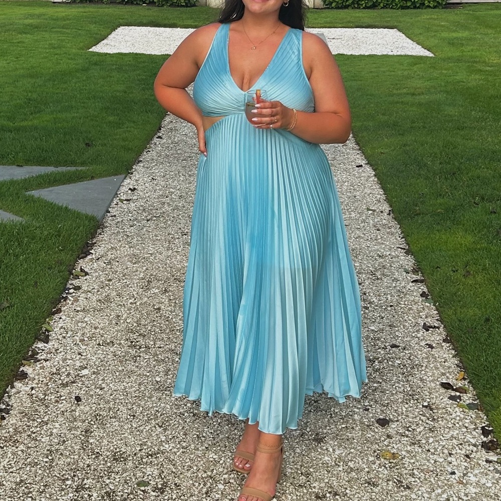 Blue silk pleated gown